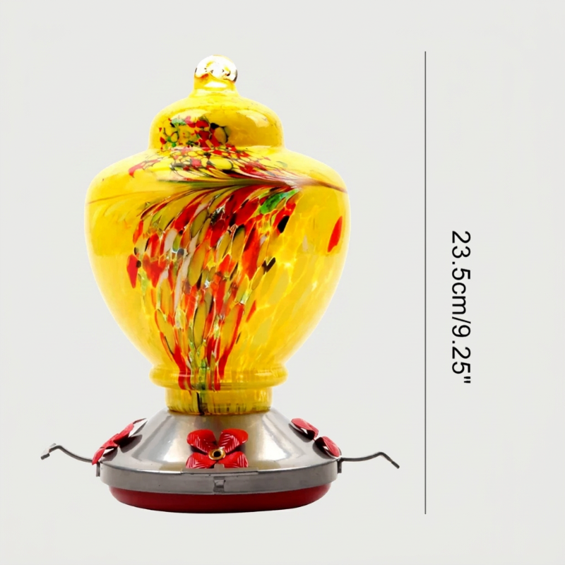 Colorful hummingbird feeder with a yellow base and red accents, featuring dimensions on a light gray background.