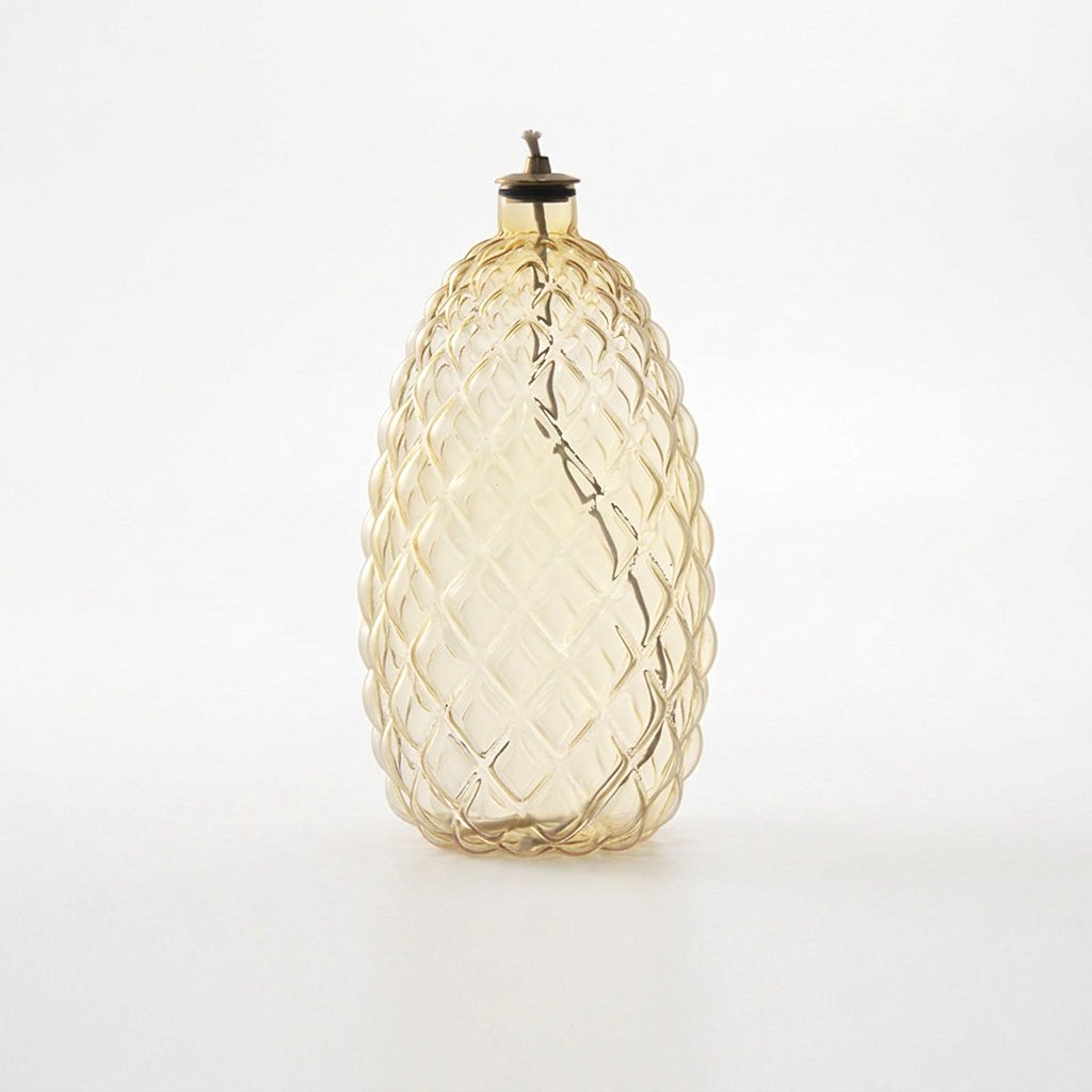Pinecone glass oil lamp product photo on a white background