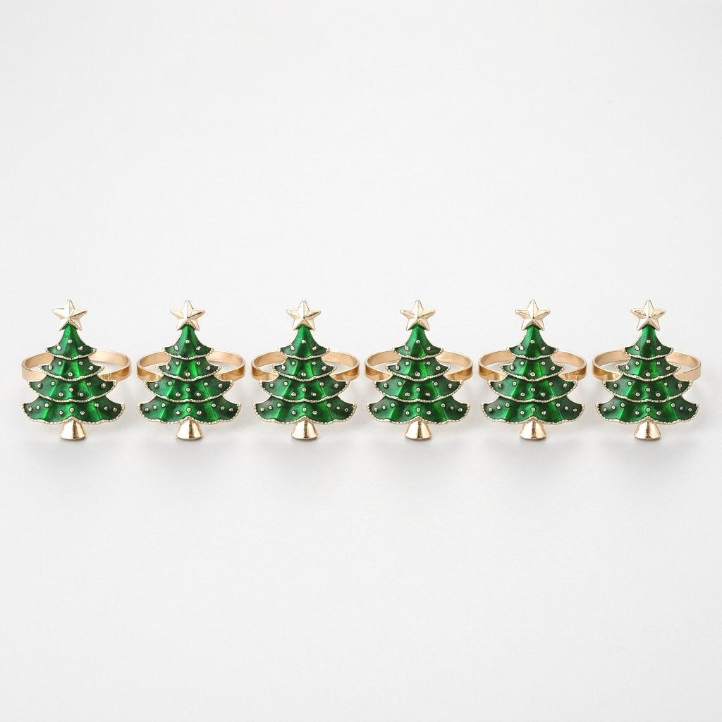 Six green enamel Christmas tree napkin rings with gold trim in a row on a white background