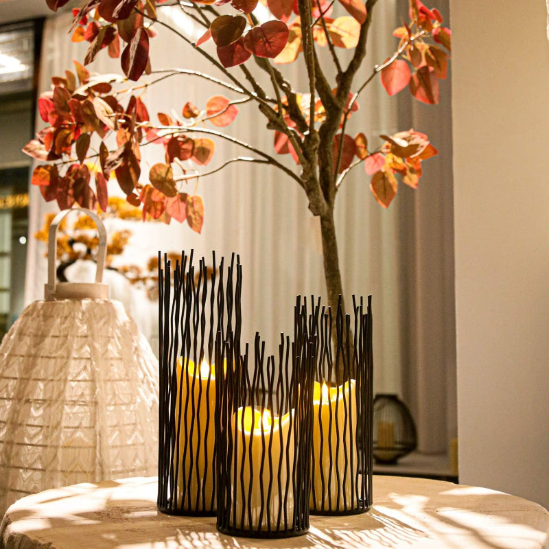 Stylish iron candle stands with a sleek design, perfect for showcasing candles and enhancing your home decor.