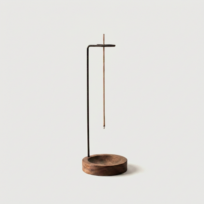 Kanso suspended walnut wood incense burner with white background.