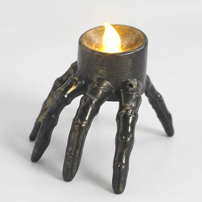 Lit Hand LED Halloween candle product photo on a white background