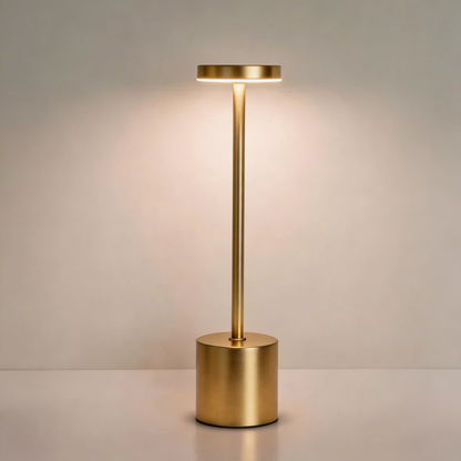 Gold floor lamp on a neutral background
