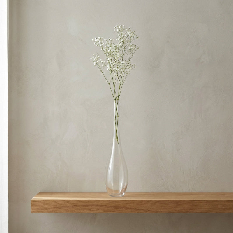 Lucia hand-blown clear glass vase with white flower on floating shelf