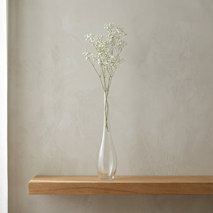 Lucia hand-blown clear glass vase with white flower on floating shelf