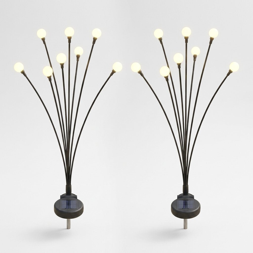 Two lit solar garden lights with 8 warm-white bulbs each on a plain studio background