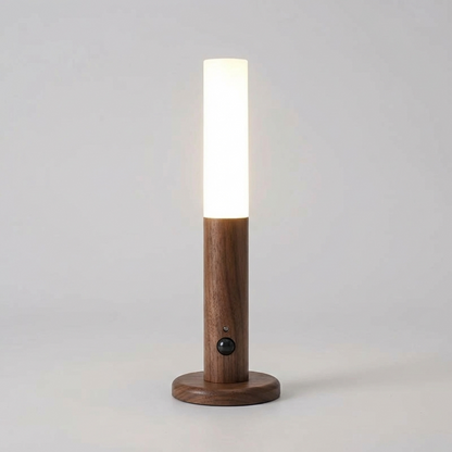Wooden lamp with a cylindrical design on a light gray background