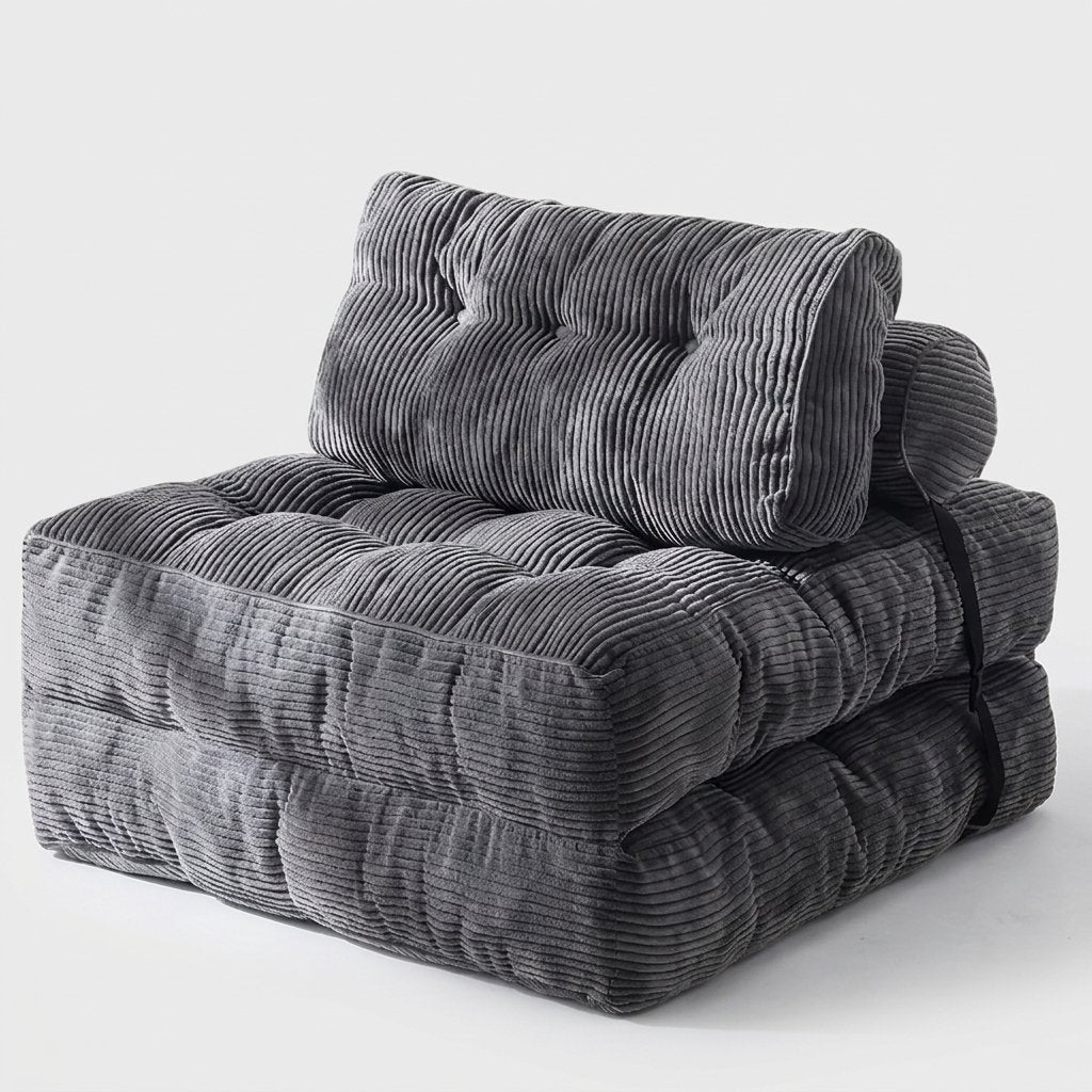 A dark gray corduroy floor cushion with a matching tufted backrest cushion, shown on a clean light gray background.