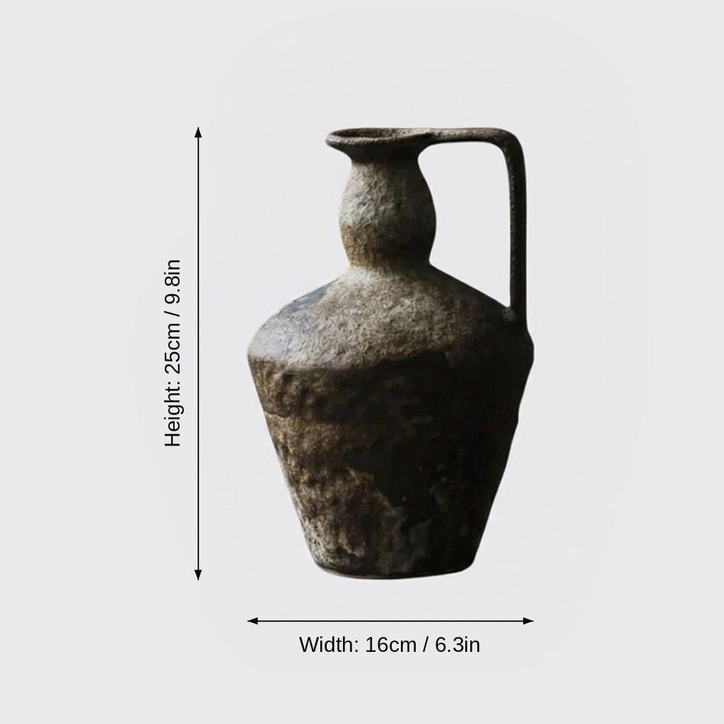 Dimensions graphic of a dark brown-gray single-handled ceramic pitcher vase labeled Height 25cm / 9.8in and Width 16cm / 6.3in