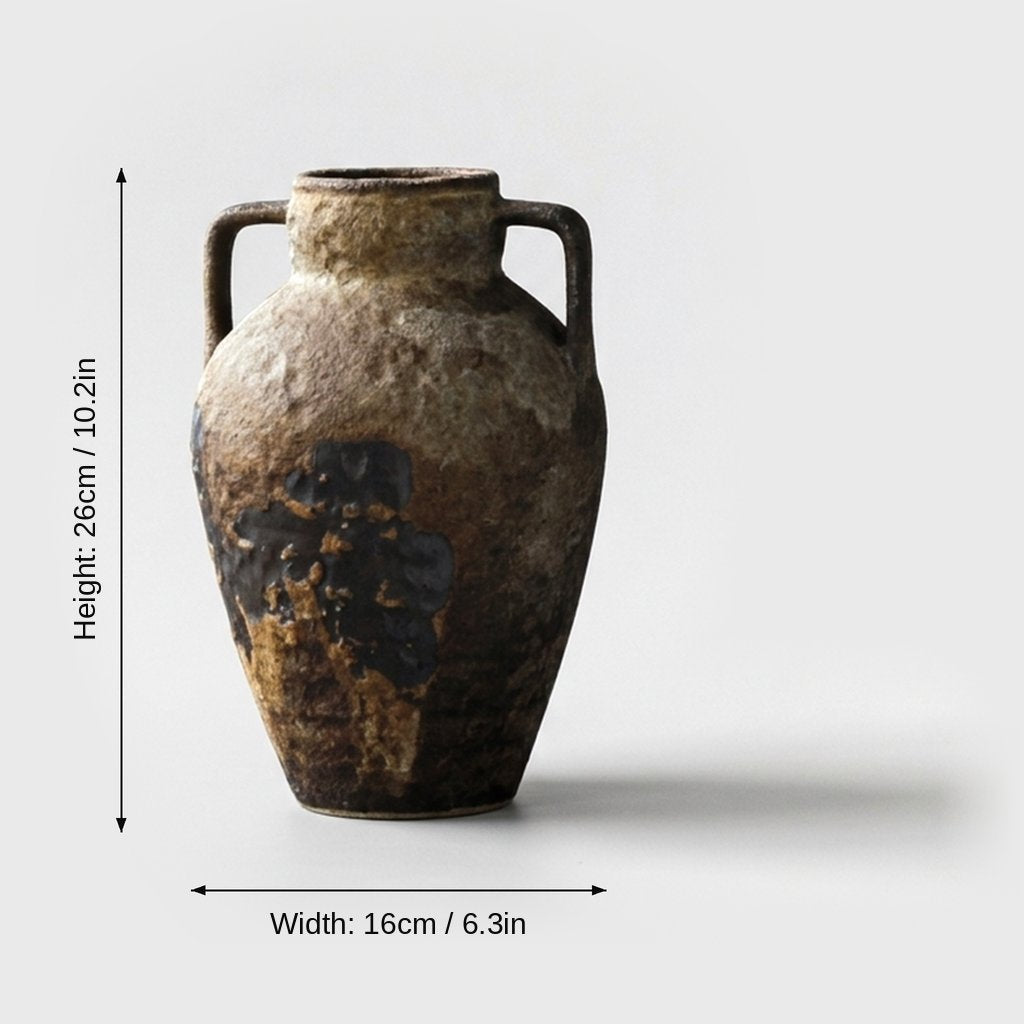 Dimensions graphic of a tan and ochre two-handled ceramic vase labeled Height 26cm / 10.2in and Width 16cm / 6.3in