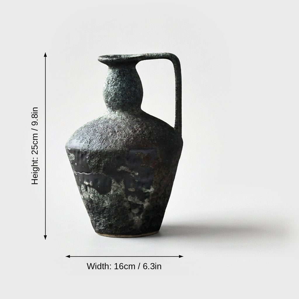 Dimensions graphic of a dark slate gray-green single-handled ceramic pitcher vase labeled Height 25cm / 9.8in and Width 16cm / 6.3in