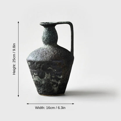 Dimensions graphic of a dark slate gray-green single-handled ceramic pitcher vase labeled Height 25cm / 9.8in and Width 16cm / 6.3in