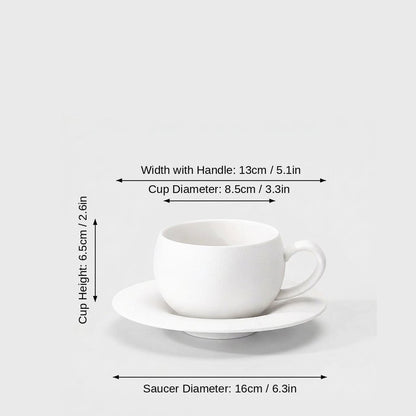 Dimensions graphic of a matte white ceramic cup and saucer labeled Width with Handle 13cm / 5.1in, Cup Diameter 8.5cm / 3.3in, Cup Height 6.5cm / 2.6in and Saucer Diameter 16cm / 6.3in