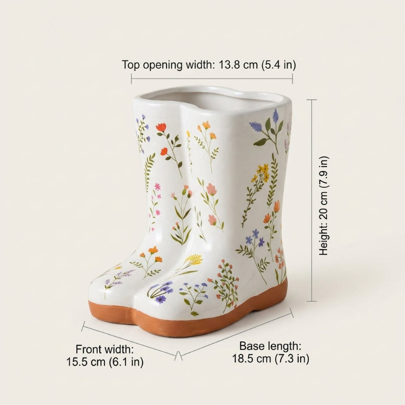 White rain boot with floral patterns and measurements on a light beige background