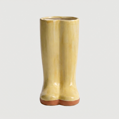 Yellow Meadow boot vase on white background