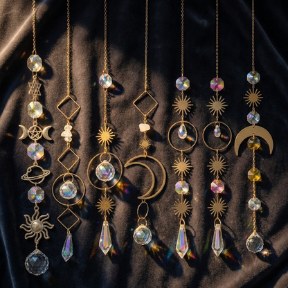 Meditation suncatchers hanging together in moody display