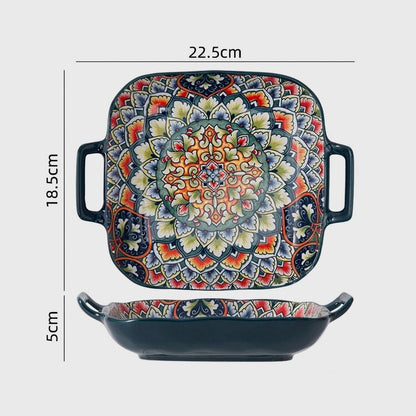 Patterned ceramic square dish with two loop handles shown from above and the side, labeled 22.5cm across the handles, 18.5cm deep and 5cm high