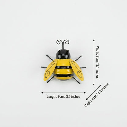 Small metal bee decoration, 9cm long by 8cm wide by 4cm deep