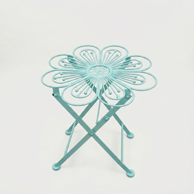 Metal flower bistro table in blue on white background