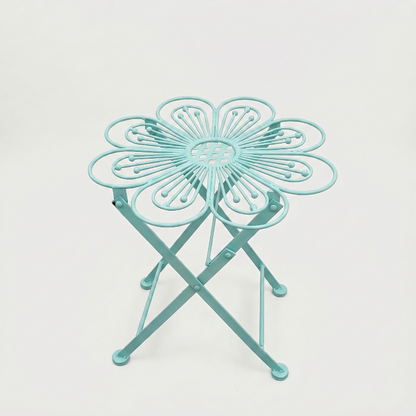 Metal flower bistro table in blue on white background