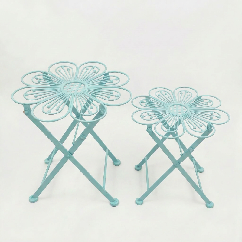 Metal flower bistro table in blue on white background