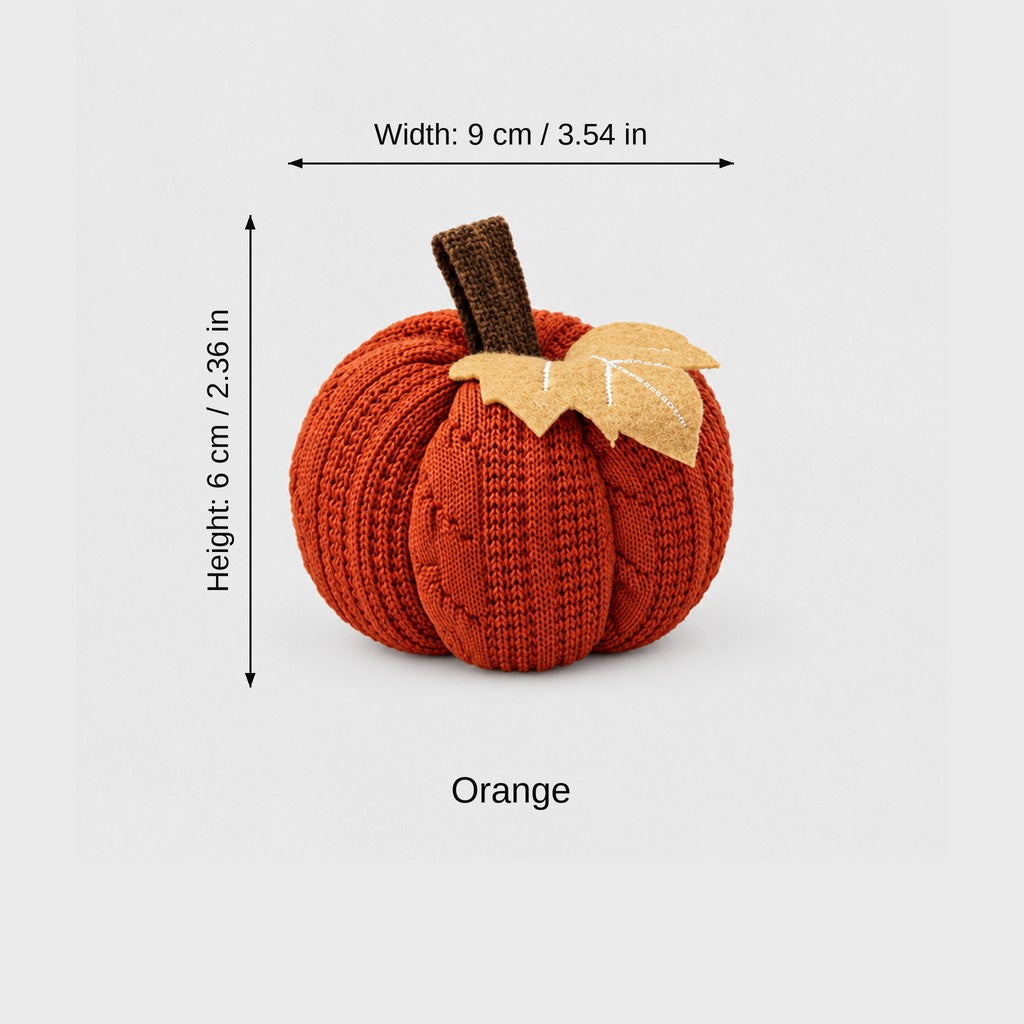 Rust orange mini knit pumpkin with brown stem and tan leaf, labeled Width 9 cm / 3.54 in and Height 6 cm / 2.36 in