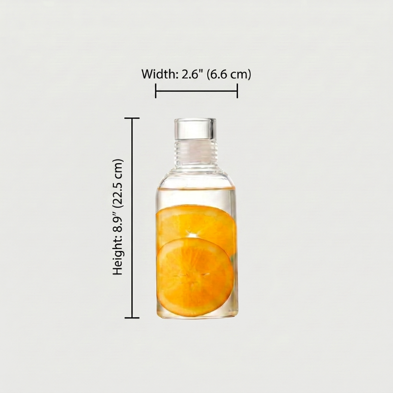 Clear bottle with sliced oranges inside, labeled with dimensions on a light gray background