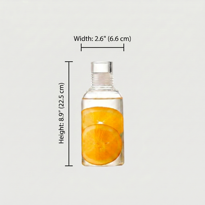 Clear bottle with sliced oranges inside, labeled with dimensions on a light gray background