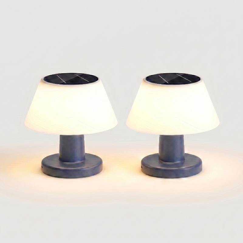 Modern portable solar table lamps shown side by side on white background