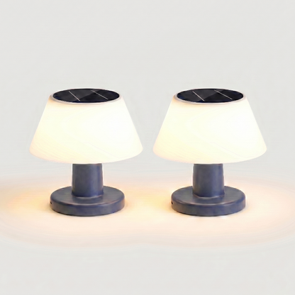 Modern portable solar table lamps shown side by side on white background