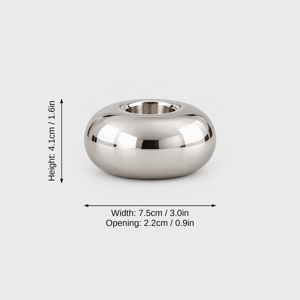 Small polished silver rounded candleholder on a pale gray background with dimension labels: height 4.1 cm or 1.6 in, width 7.5 cm or 3.0 in, opening 2.2 cm or 0.9 in