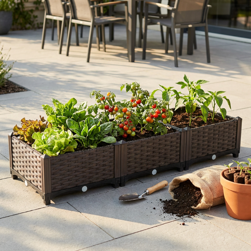 Modular raised garden planter bed with vegetables and flowers in garden setting