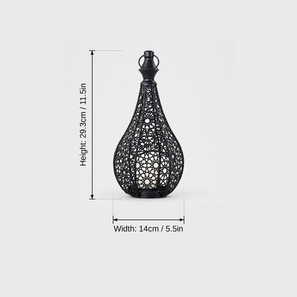 Dimensions graphic of a black cutwork metal lantern, height 29.3 cm or 11.5 in and width 14 cm or 5.5 in
