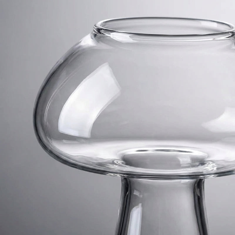 Clear glass vase on a gray background