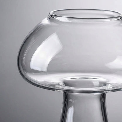 Clear glass vase on a gray background
