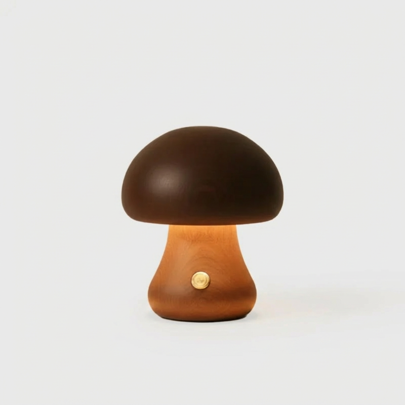 Dark wood mushroom table lamp with warm glow on white background