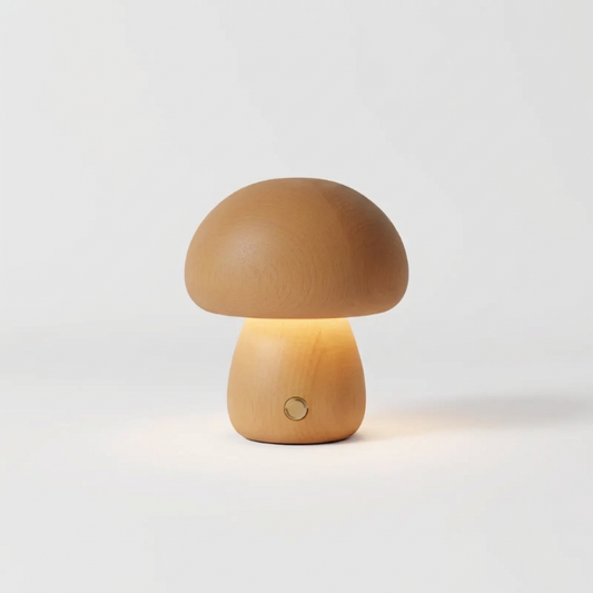 Natural wood mushroom table lamp with warm glow on white background