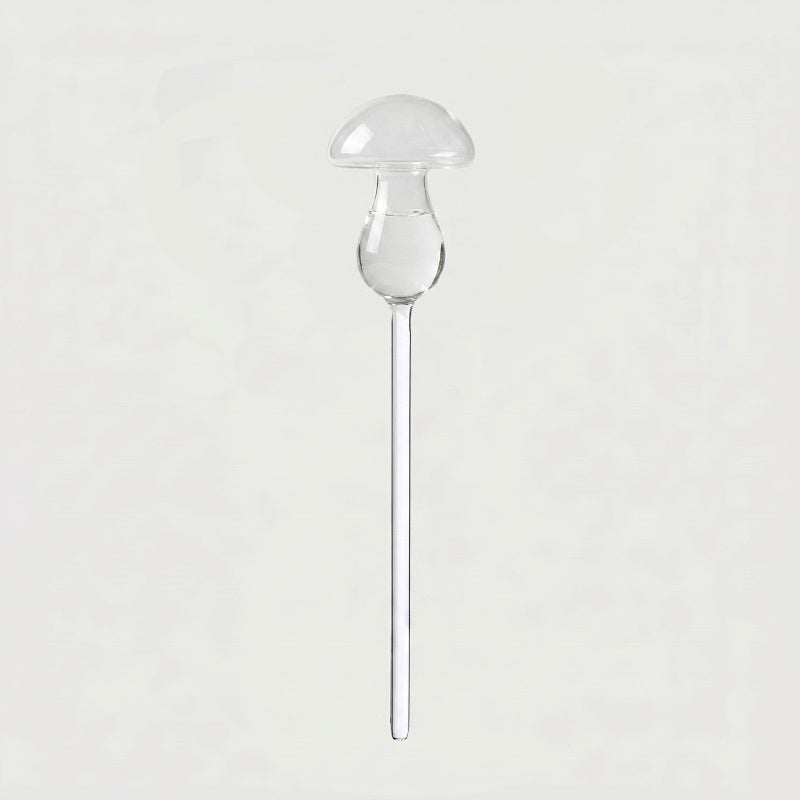 Mushroom self-watering glass plant vessel on white background