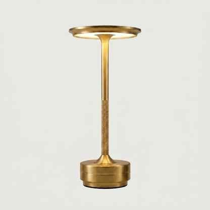 Gold floor lamp on a light gray background