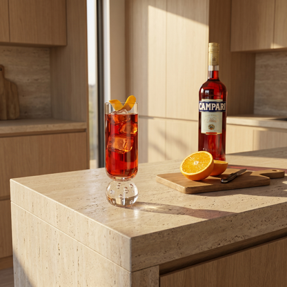 Orb base glasses with bottled drinks on kitchen counter