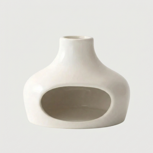 White ceramic palo santo and sage chimney burner on white background