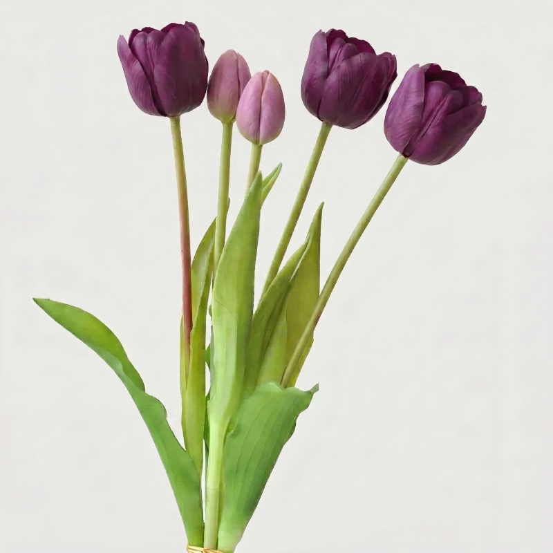 Purple parrot faux silicone tulips on white background