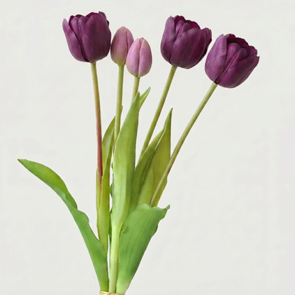 Purple parrot faux silicone tulips on white background