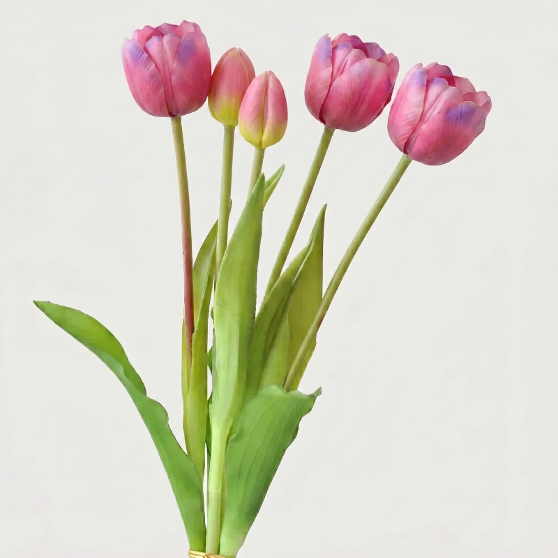Magenta parrot faux silicone tulips on white background