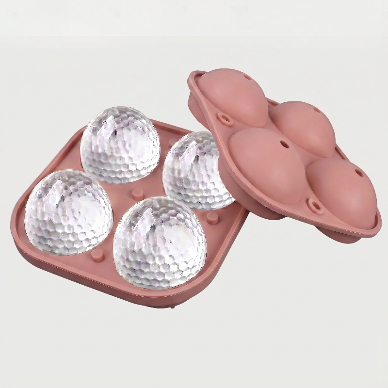 Pink golf ball ice mold tray on white background