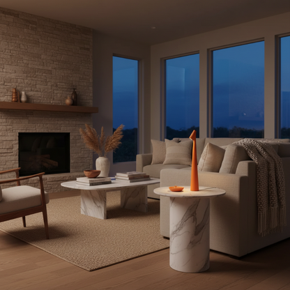 Modern living room with a fireplace, sofa, and decorative items.
