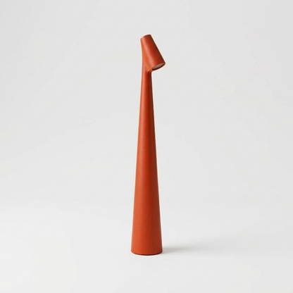 Red portable LED table lamp with sleek minimalist silhouette