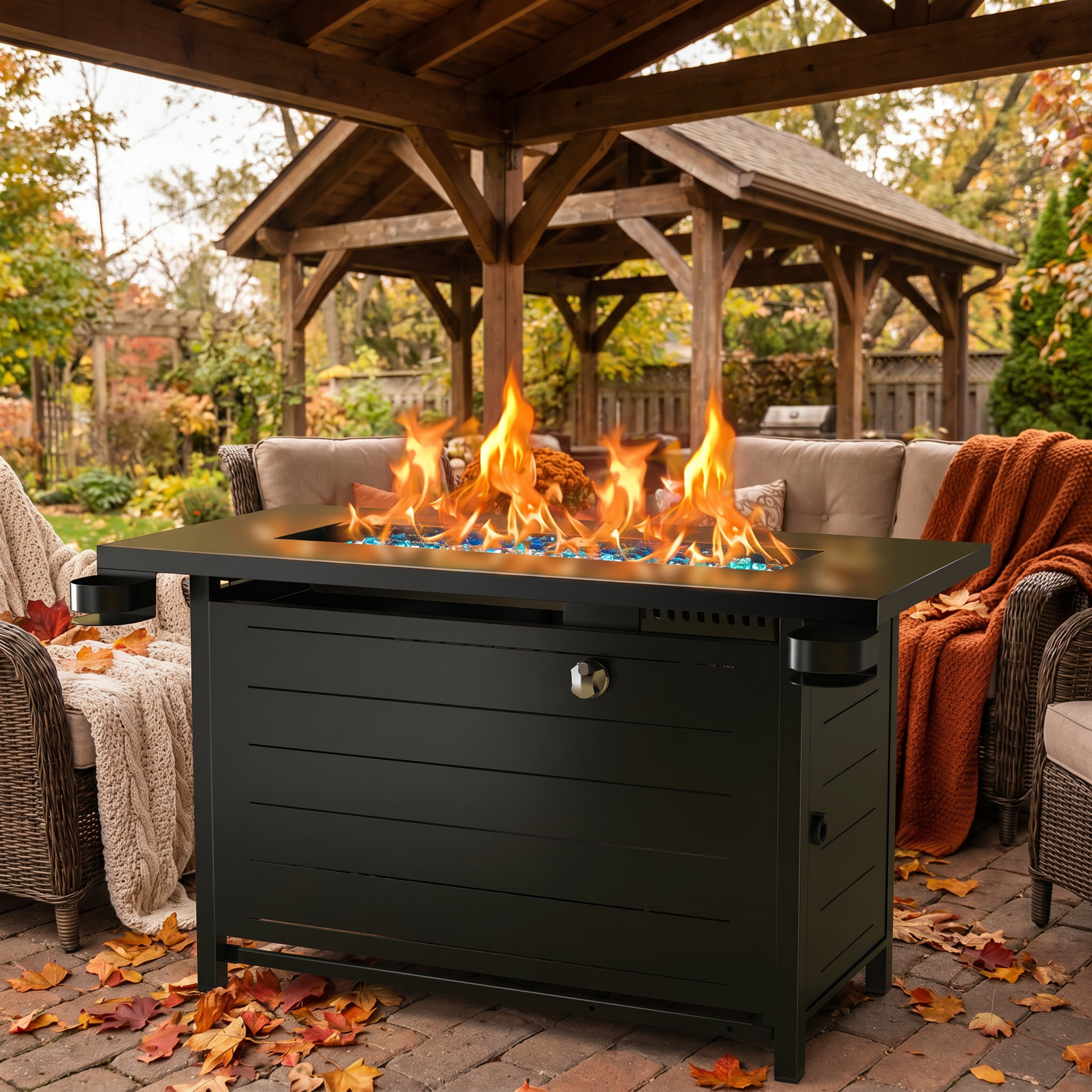 Outdoor patio with a fire pit table, chairs, and a gazebo in a garden setting.