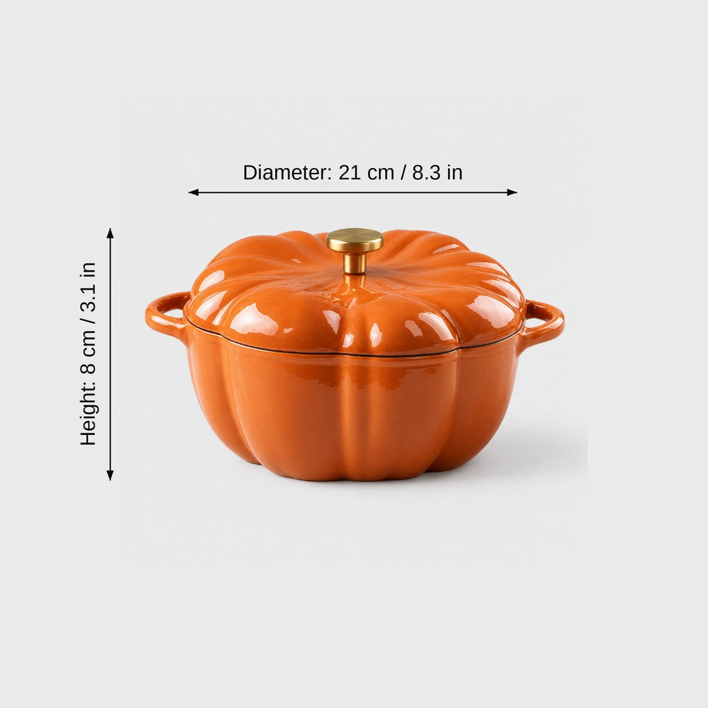 Orange pumpkin Dutch oven with lid on, labeled Diameter 21 cm / 8.3 in and Height 8 cm / 3.1 in on a plain light backdrop
