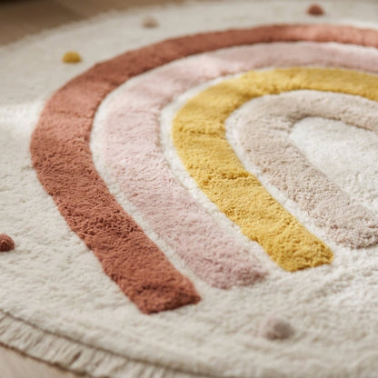 Close-up of the plush texture and tufted rainbow design on the Rainbow Education Plush Nursery Play Mat